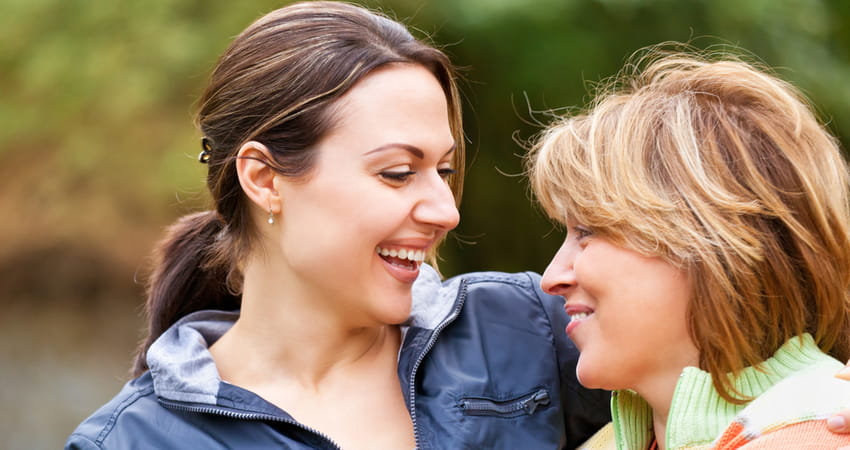 mother and daughter laughing together