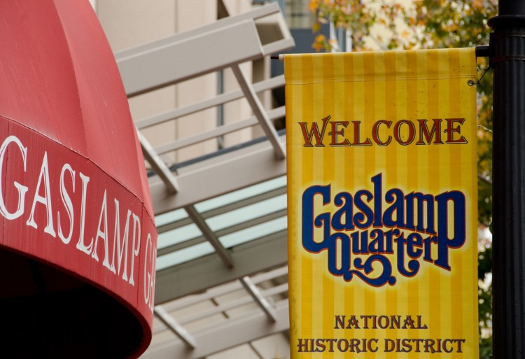 Picture of Welcome to Gaslamp Quarter sign next to the canopy on a building